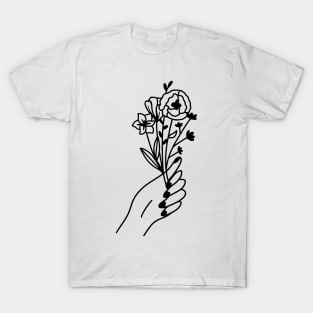 Hand holding flowers T-Shirt